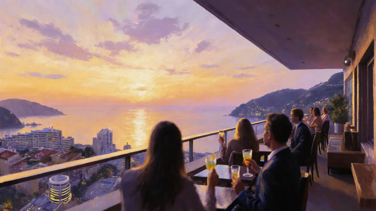 Rooftop bar at Marlena showing sunset over Port Hercules with guests sipping drinks.